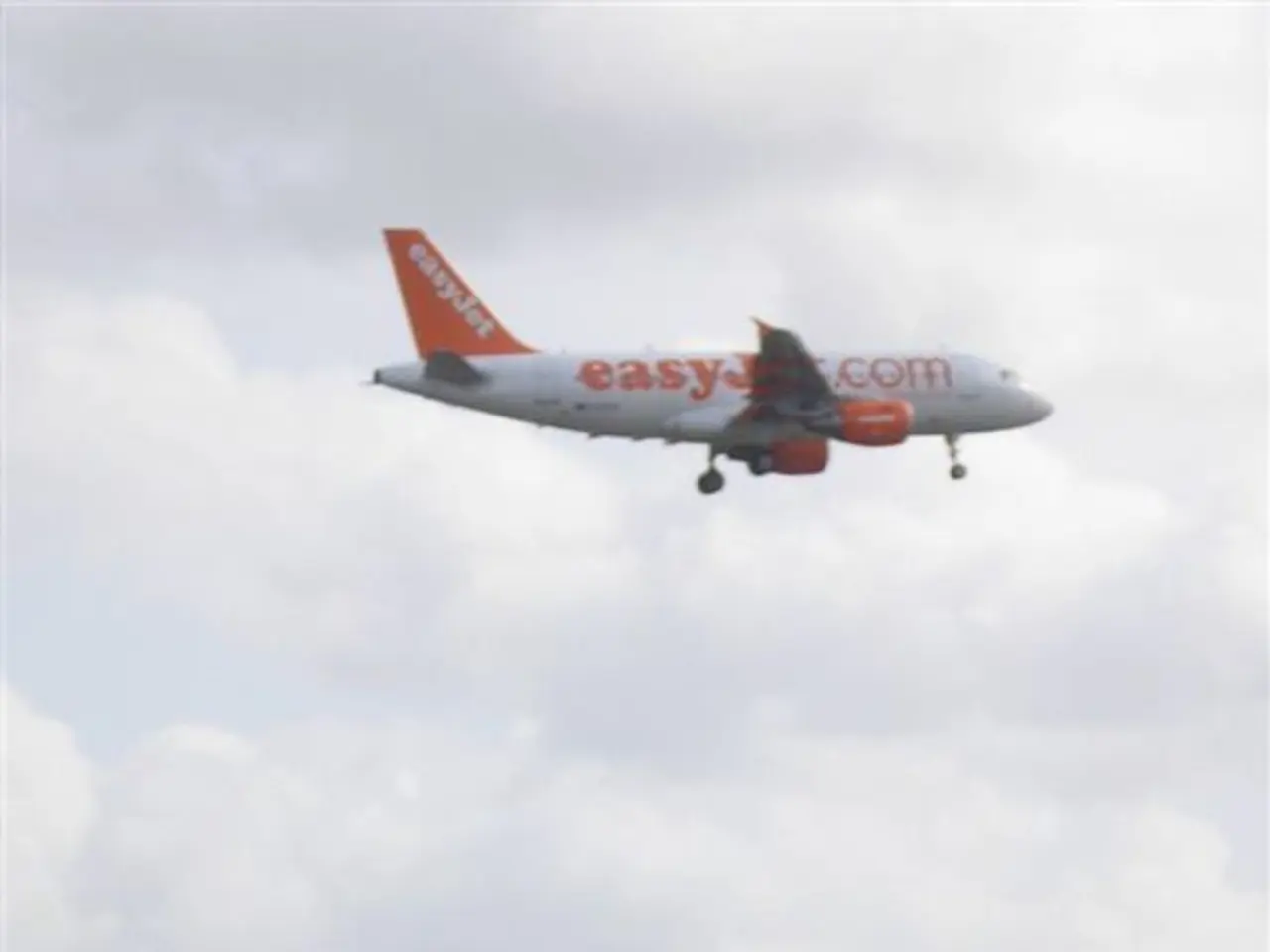 At the bottom of the image we can see the railway tracks, signal pole, sign board, flyover and...