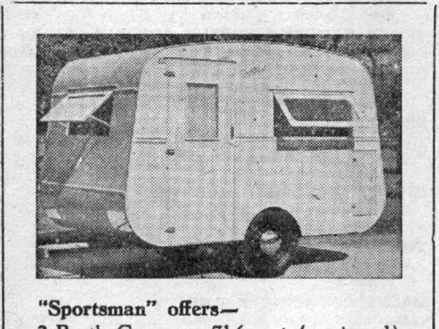 This is a black and white image. At the top of the image there is a vehicle. At the bottom there is...