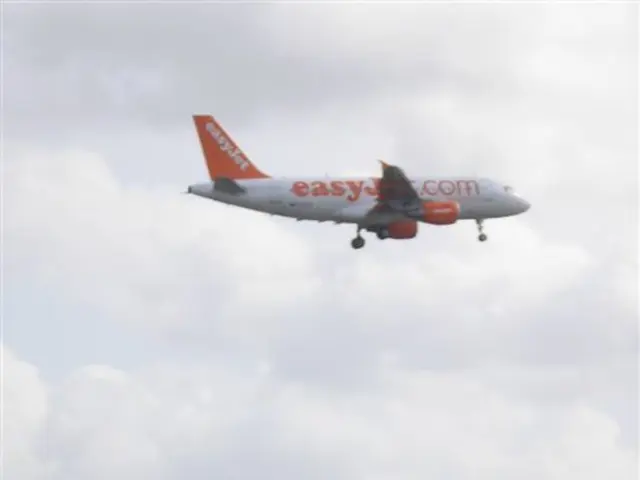 At the bottom of the image we can see the railway tracks, signal pole, sign board, flyover and...