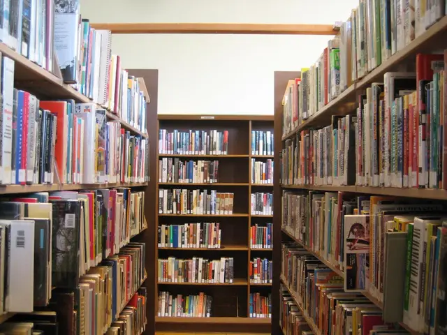 In this image I can see number of books in these shelves.