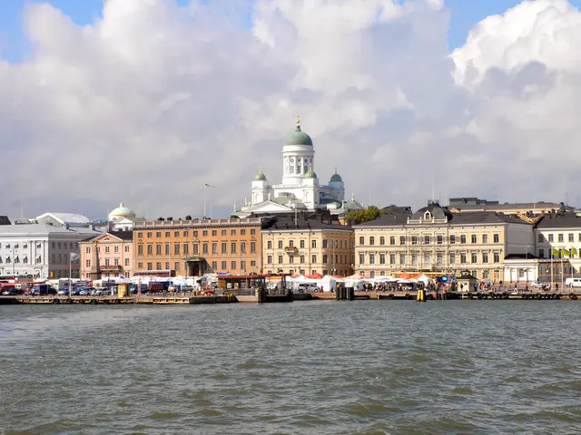 In this picture there is a brown and white color building with many windows. Behind there is a...