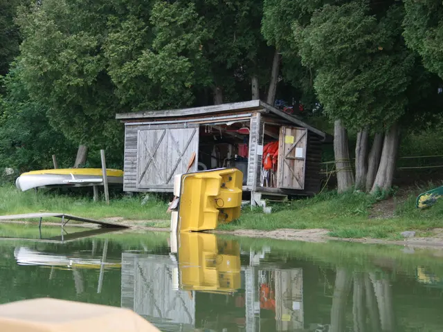 There is water, boat, a shed in which there are few items. There are trees, fence and other...