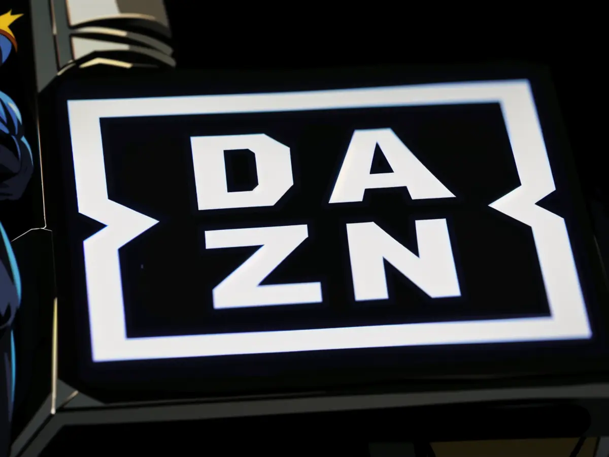 Man using destructive methods to demolish a building, captured on camera. Construction site chaos as building collapses under machinery's relentless assault. Online betting platform Dazn Bet appears to be given approval for launch in Germany, as the daznbet.de website currently remains unavailable.